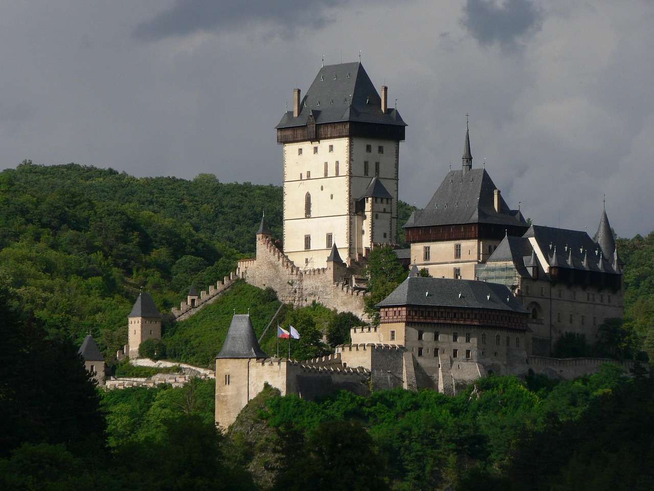Karlštejn Castle above the forest